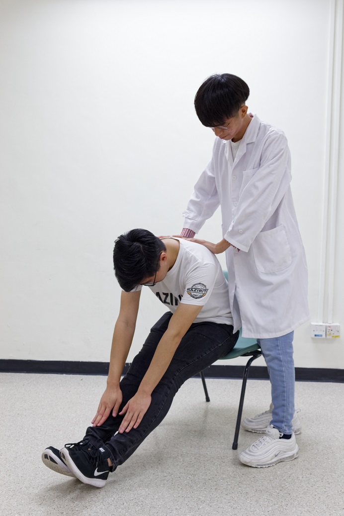 Physiotherapist stretching exercise paediatric